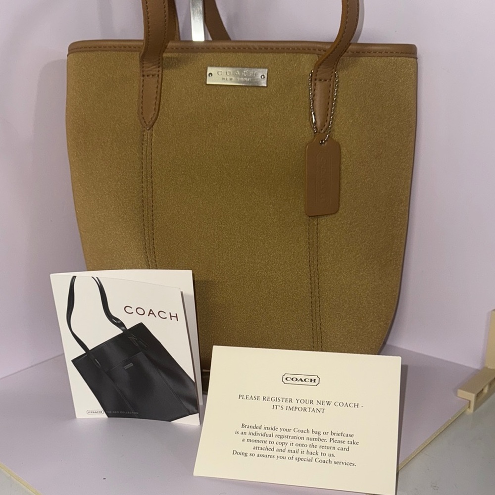 Coach Tan Neoprene tote, style 6201 with original Coach care papers. Never used.